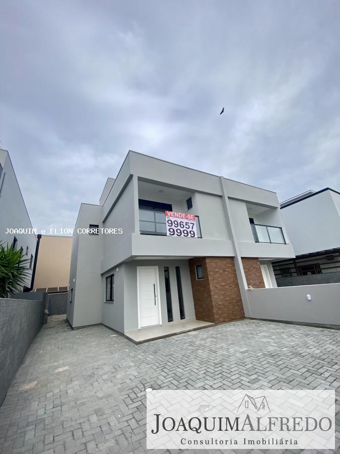 Casa à venda com 3 quartos, 132m² - Foto 1